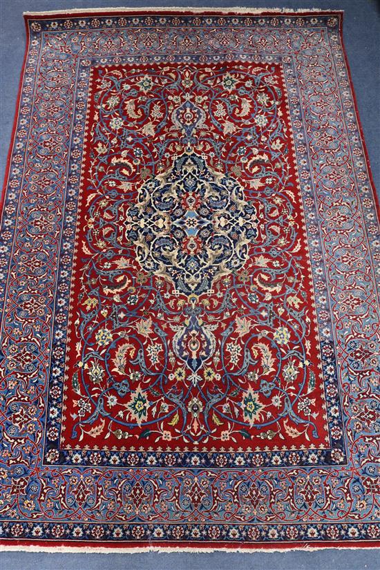 A Tabriz silk red medallion rug (moth damaged) 110 x 170cm